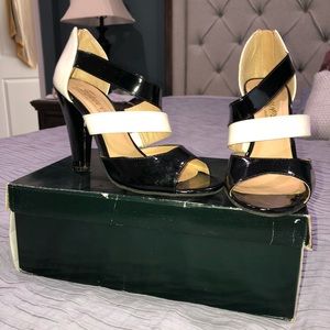 High heels . Black and white. Size 6.5